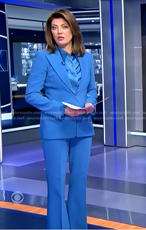 Norah’s blue satin shirt and peak lapel blazer on CBS Evening News