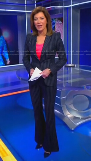 Norah’s navy pinstripe suit on CBS Evening News