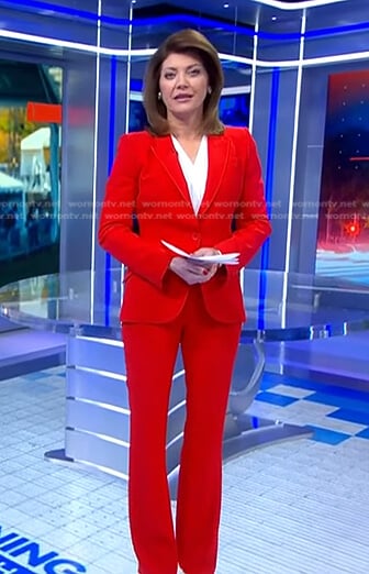 Norah's red suit on CBS Evening News