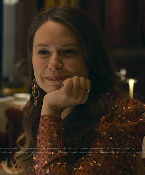 Rachel’s orange printed dress at dinner in Morroco on Inventing Anna