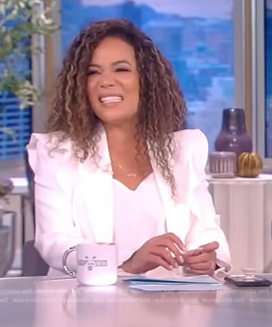 Sunny’s white ruffled blazer on The View