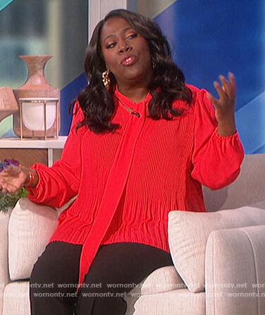 Sheryl's red pleated tie neck blouse on The Talk