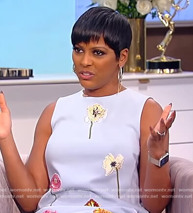 Tamron’s blue floral embroidered mini dress on Tamron Hall Show