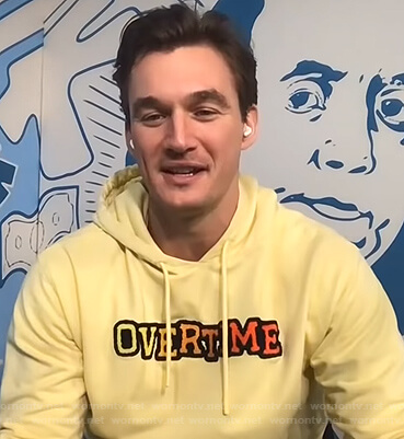 Tyler Cameron's yellow Overtime hoodie on E! News Daily Pop