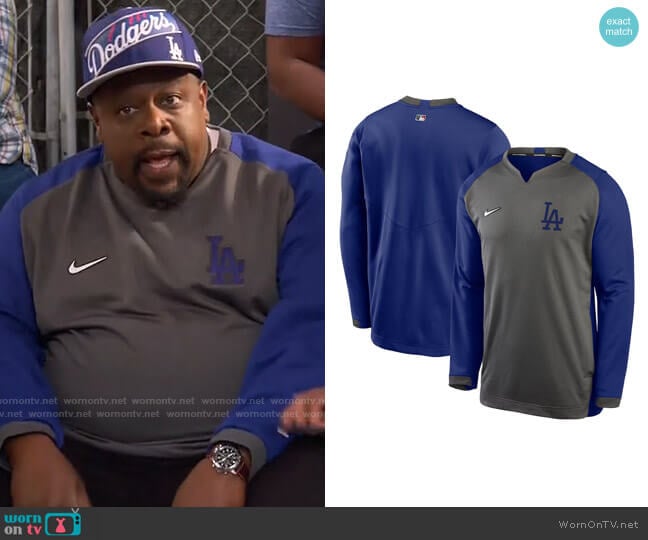 Nike Charcoal Royal Los Angeles Dodgers Authentic Collection Thermal Crew Performance Pullover Sweatshirt worn by Calvin (Cedric The Entertainer) on The Neighborhood