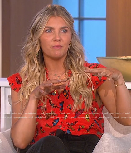 Amanda’s red butterfly print ruffle top on The Talk