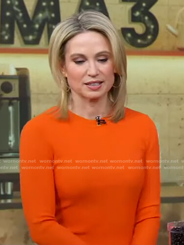Amy’s orange ribbed top and brown leather leggings on Good Morning America