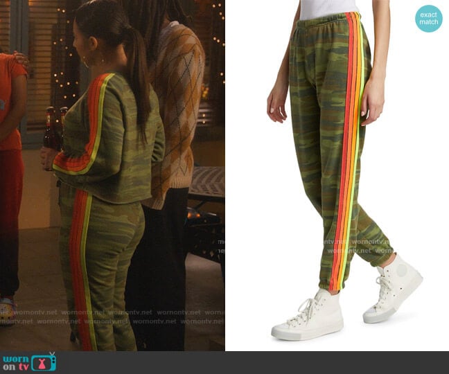 Neon Four-Stripe Sweatpants by Aviator Nation worn by Ana Torres (Francia Raisa) on Grown-ish