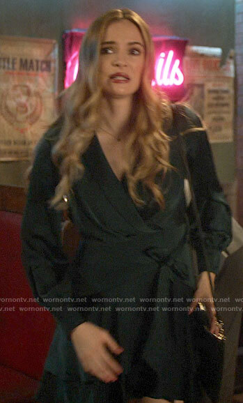 Caitlin's dark green satin wrap dress on The Flash