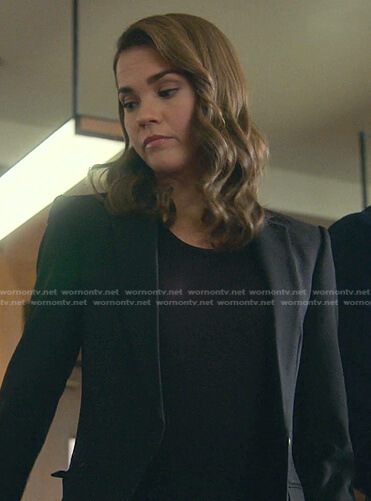 Callie's black blazer with gold snap buttons on Good Trouble