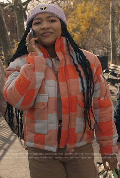 Delilah's orange checked jacket and alien beanie on The Equalizer