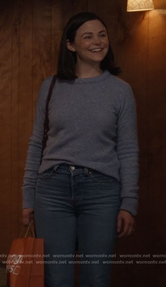 Jodie's blue rolled neck sweater on Pivoting