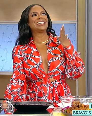 Kandi Burruss' red printed tie front jumpsuit on Tamron Hall Show