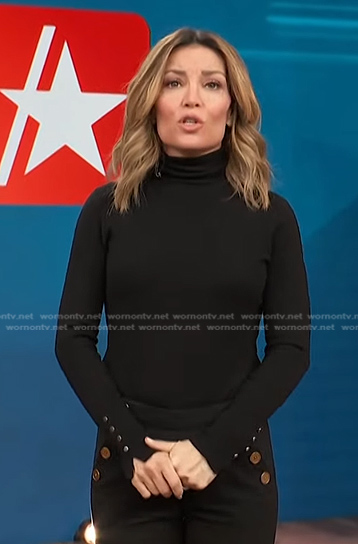 Kit’s black button cuff turtleneck sweater on Access Hollywood