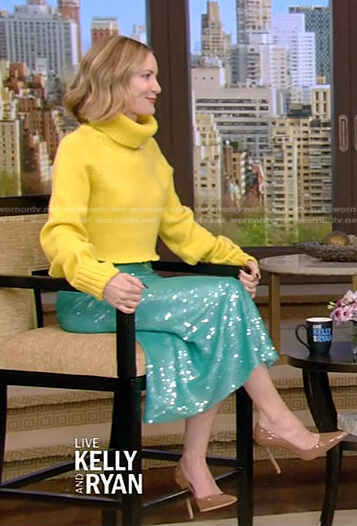 Leslie Mann’s yellow turtleneck sweater and sequin skirt on Live with Kelly and Ryan