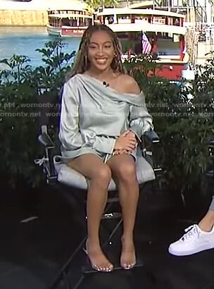 Lexi Underwood’s sage green one off-shoulder top and shorts on Access Hollywood