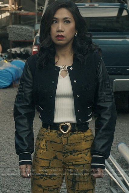 Mel's leather sleeve bomber jacket, chain detail top, heart belt and brick print jeans on The Equalizer