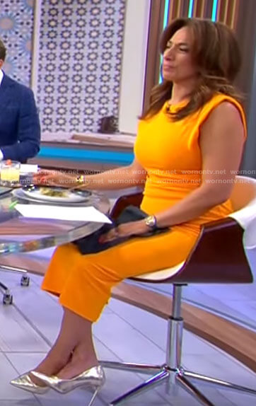 Michelle Miller’s orange midi dress on CBS Saturday Morning