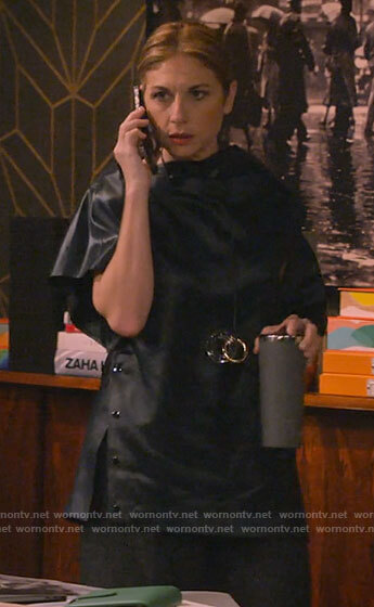 Naomi’s black draped top on How I Met Your Father