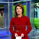 Norah’s red peplum jacket and pants on CBS Evening News