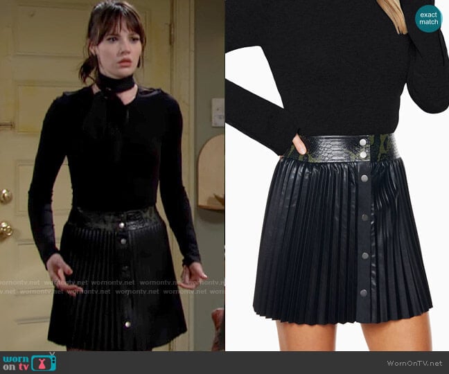 Ramy Brook Embossed Anya Pleated Mini Skirt worn by Tessa Porter (Cait Fairbanks) on The Young and the Restless