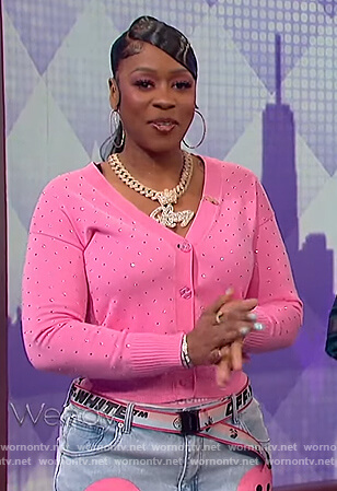 Remy Ma’s pink eyelet cardigan and smiley face jeans on The Wendy Williams Show