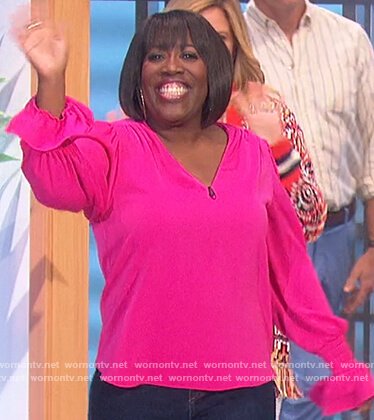 Sheryl’s pink bell cuff top on The Talk
