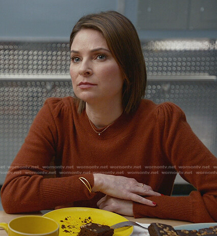 Taylor’s brown puff sleeve sweater on Bull