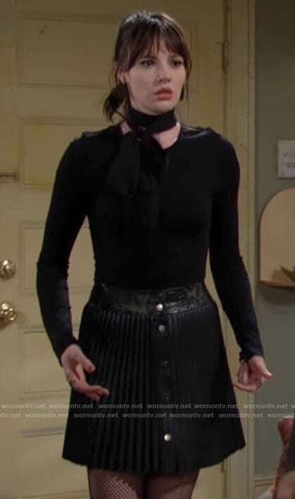 Tessa’s black pleated leather skirt on The Young and the Restless