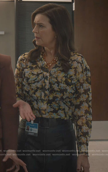 Vivian's floral button down blouse on Good Sam