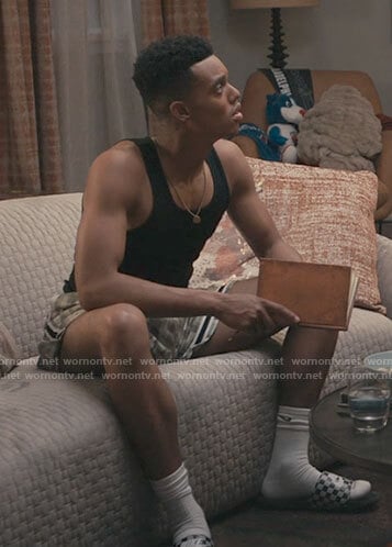 Will's green printed shorts and checkerboard slides on Bel-Air