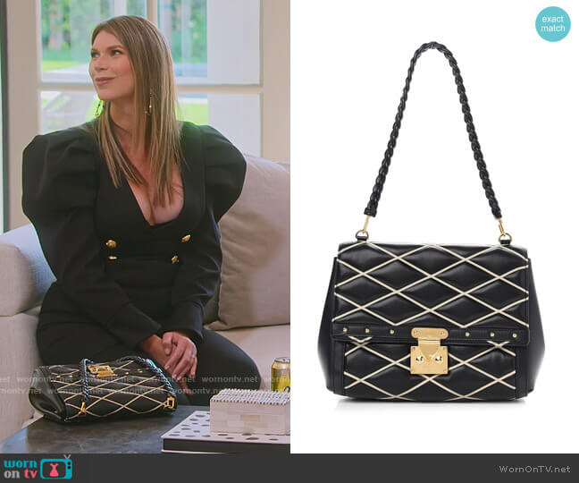 Lambskin Malletage Pochette Flap Bag by Louis Vuitton worn by Maya Vander on Selling Sunset