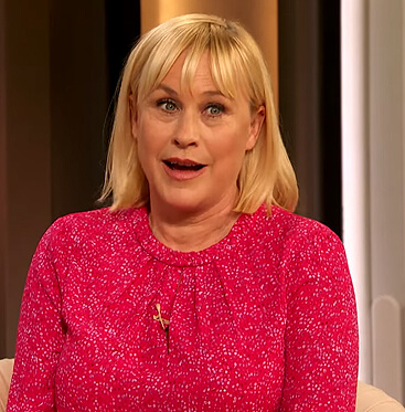 Patricia Arquette’s pink printed keyhole blouse on The Drew Barrymore Show