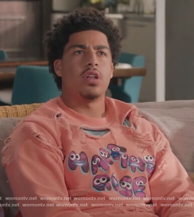 Junior’s coral distressed sweatshirt on Black-ish
