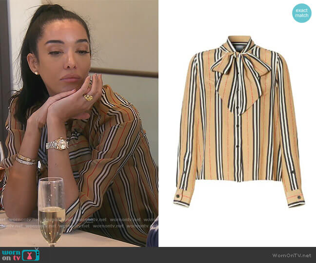 Icon Stripe pussy-bow blouse by Burberry worn by Noella Bergener  on The Real Housewives of Orange County