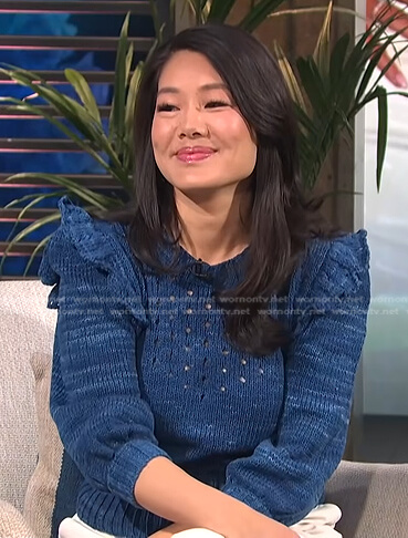 Crystal Kung Minkoff’s blue pointelle ruffle sweater on E! News Daily Pop