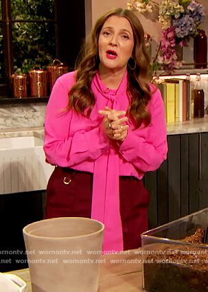 Drew's pink tie neck blouse and pants on The Drew Barrymore Show