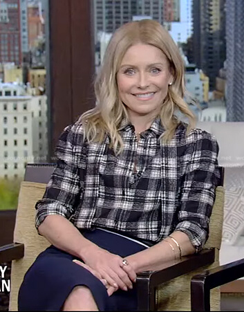 Kelly’s black plaid blouse and navy skirt on Live with Kelly and Ryan