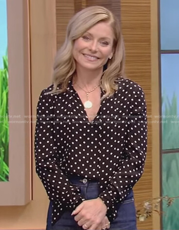 Kelly’s black polka dot blouse and jeans on Live with Kelly and Ryan