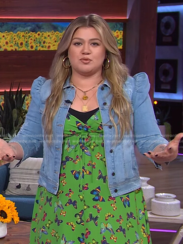 Kelly’s green butterfly print dress and puff sleeve denim jacket on The Kelly Clarkson Show
