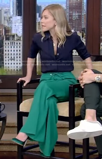 Kelly's navy blouse and green drawstring waist pants on Live with Kelly and Ryan