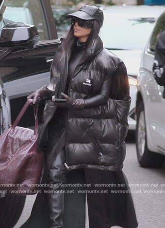 Kim's black puffer jacket on The Kardashians