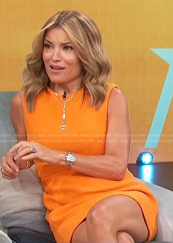 Kit’s orange textured sleeveless dress on Access Hollywood