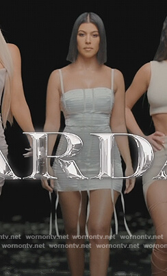Kourtney’s white satin ribbon dress on The Kardashians