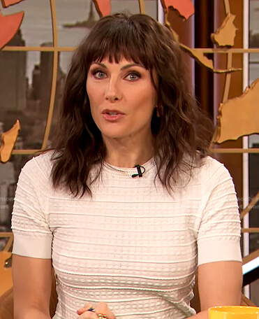 Laura Benanti's white textured short sleeve sweater on The Drew Barrymore Show