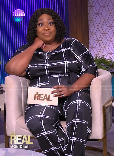 Loni's black windowpane check jumpsuit on The Real