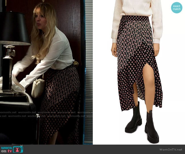 Cassie’s mixed print midi skirt on The Flight Attendant