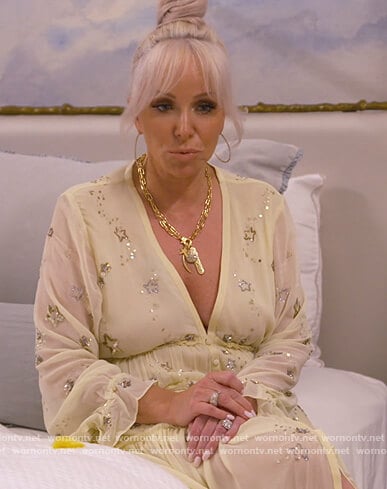 Margaret’s yellow star embellished dress on The Real Housewives of New Jersey