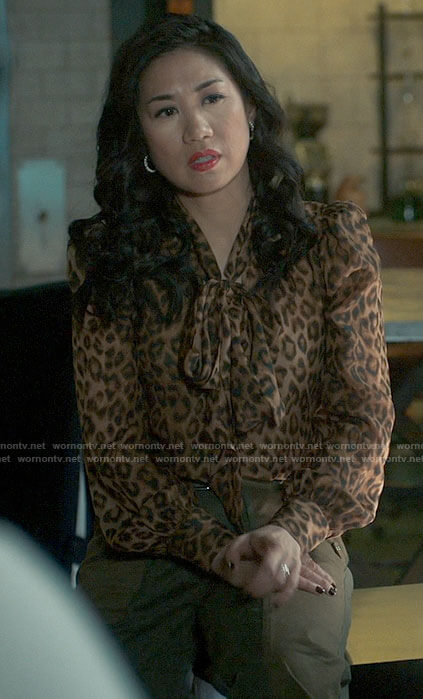 Mel’s leopard print blouse and cargo pants on The Equalizer