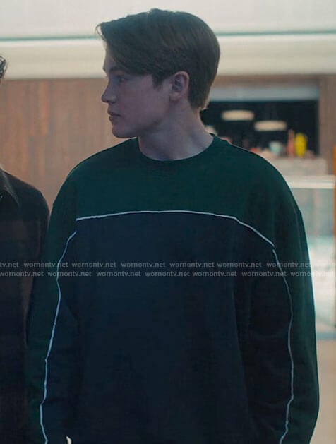 Nick’s green and navy sweatshirt on Heartstopper
